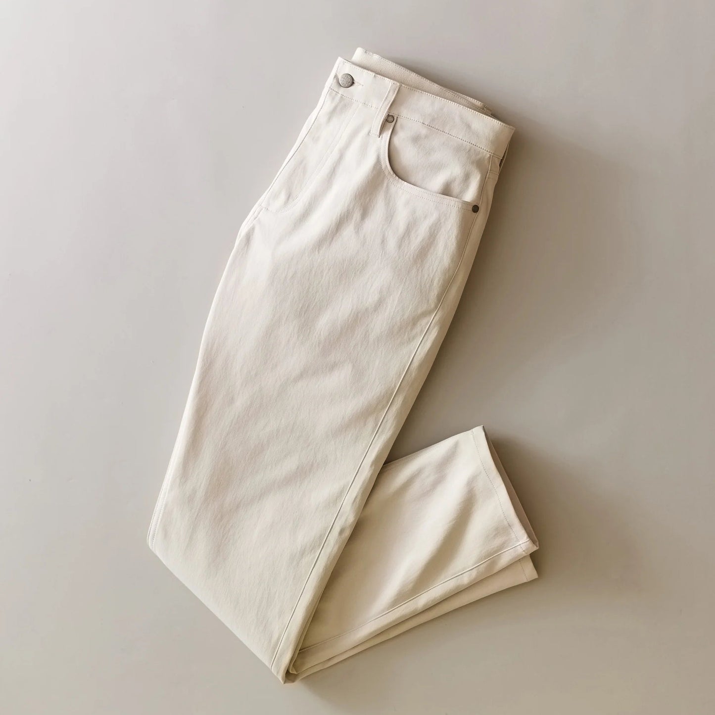 Marine Layer The 5-Pocket Undercover Tech Pant in Stone, now available at Harbour Thread men's store
