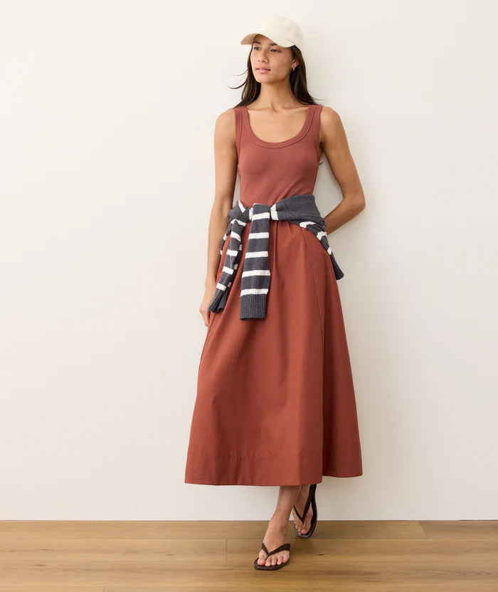 Enjoy effortless summer style when you wear the Marine Layer Lexi Rib Poplin Midi Dress, now available at Harbour Thread women's boutique in Burlington, VT. 