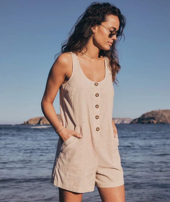 Woman at the water wearing the Summer Stripe Sydney Romper by Marine Layer