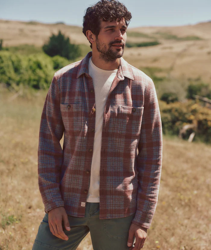 A man outside wearing the Pacifica Stretch Twill Shirt by Marine Layer