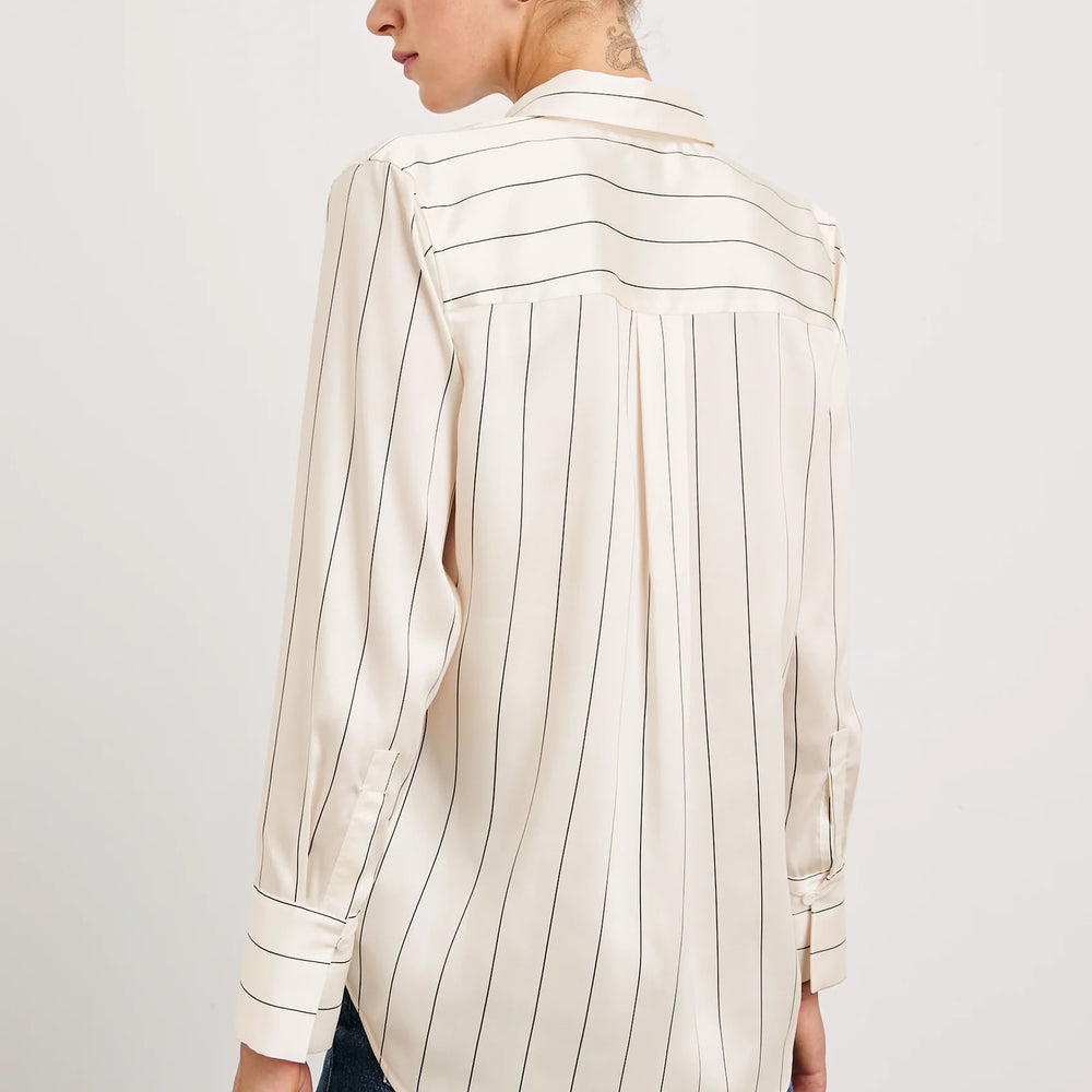 Back view of a woman wearing the Brixton Stripe Saige Shirt by the brand Rails