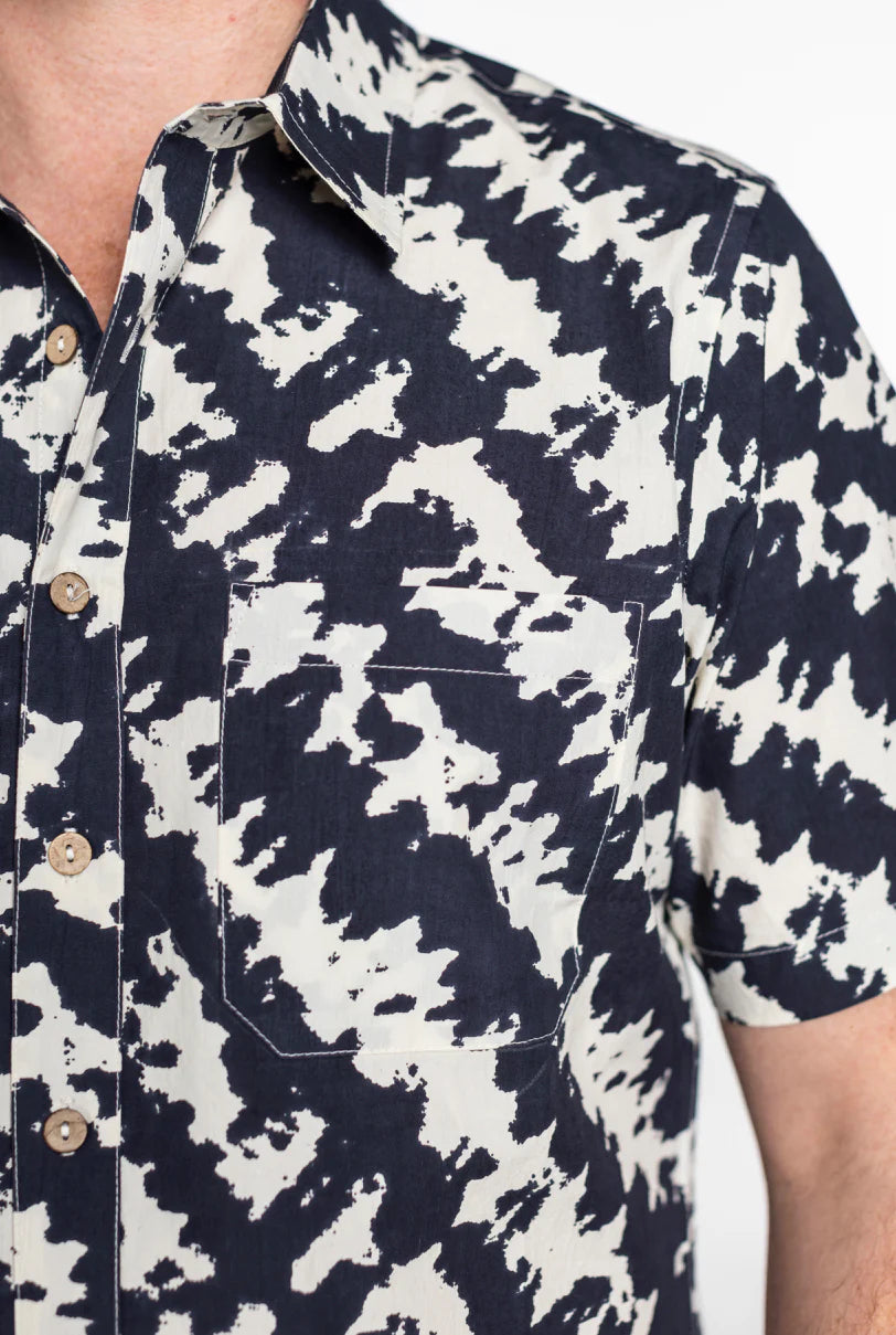 Enjoy the navy and white color blender design on this short sleeve button down shirt from One World Brothers, now available at Harbour Thread