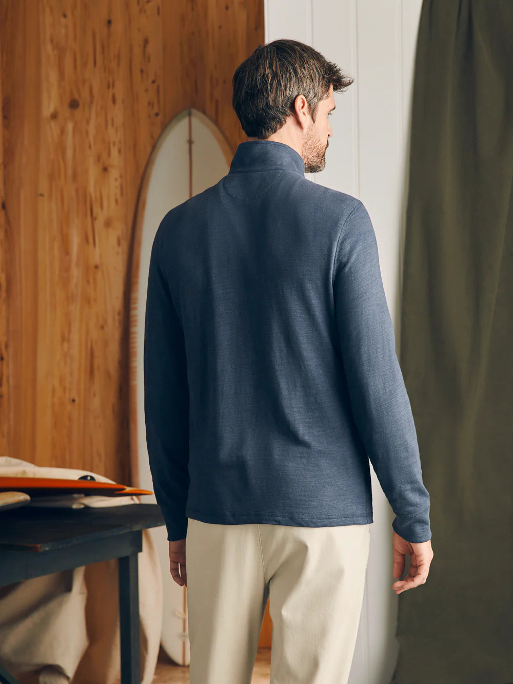 Back view of Faherty's Sunwashed Slub Quarter Zip Pullover in the color Blue Nights