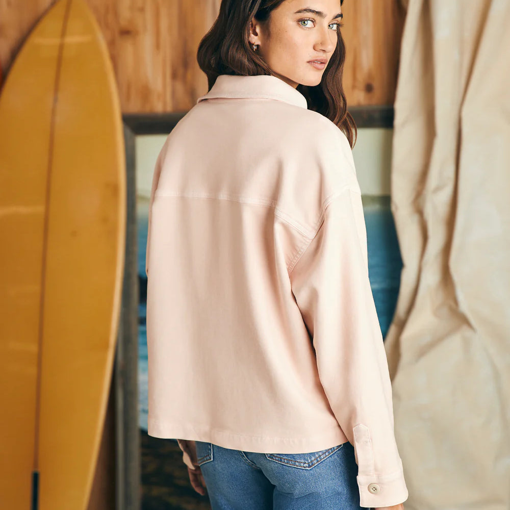 
                      
                        Back iew of woman wearing a peach color long sleeve overshirt
                      
                    