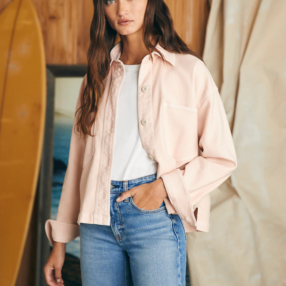 
                      
                        Front iew of woman wearing an unbuttoned peach color long sleeve overshirt
                      
                    