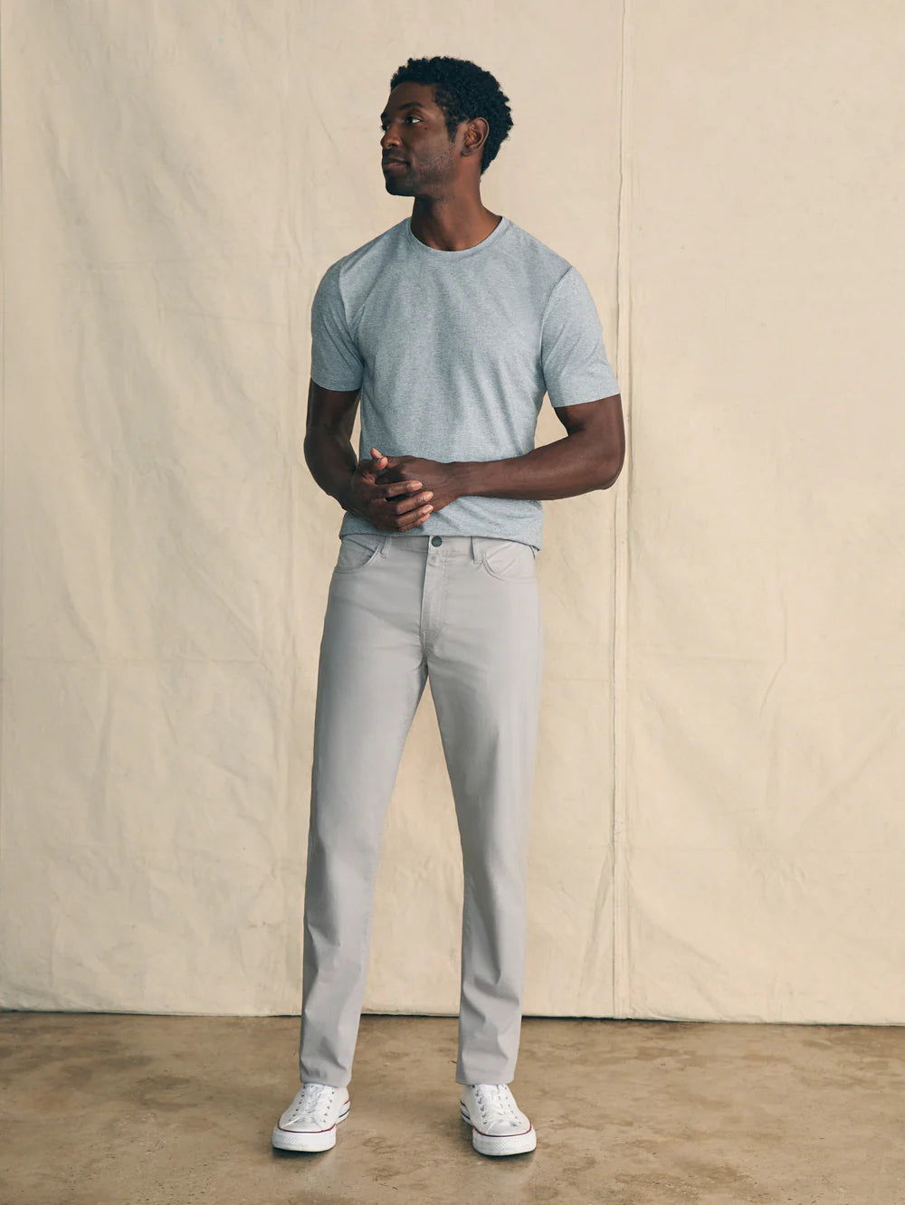 The men's Movement 5-Pocket Pant by Faherty, in the color Fossil