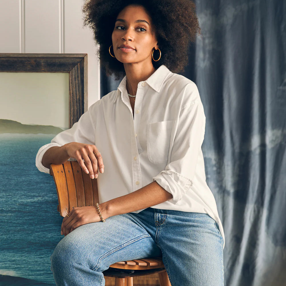 
                      
                        Women's wearing Faherty's Stretch Oxford Relaxed Shirt in the color White
                      
                    