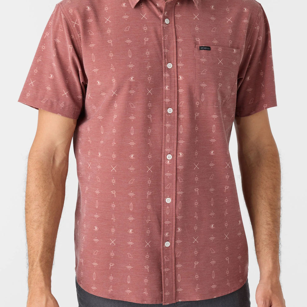 A man wearing the TRVLR UPF Traverse Short Sleeve Shirt by O'Neill in the color Mohogany