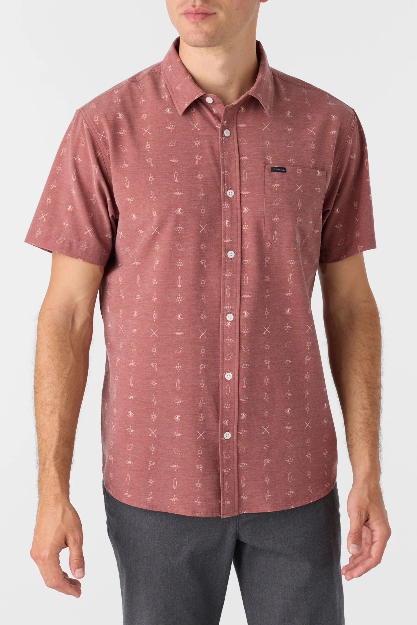 A man wearing the TRVLR UPF Traverse Short Sleeve Shirt by O'Neill in the color Mohogany