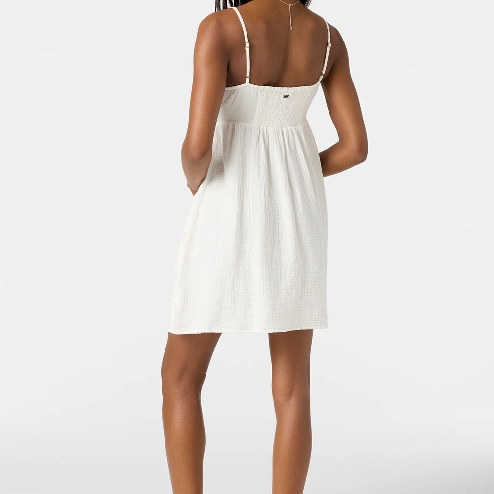 
                      
                        This white double cotton gauze mini dress at Harbour Thread offers smocked backing and adjustable spaghetti straps for your perfect fit
                      
                    