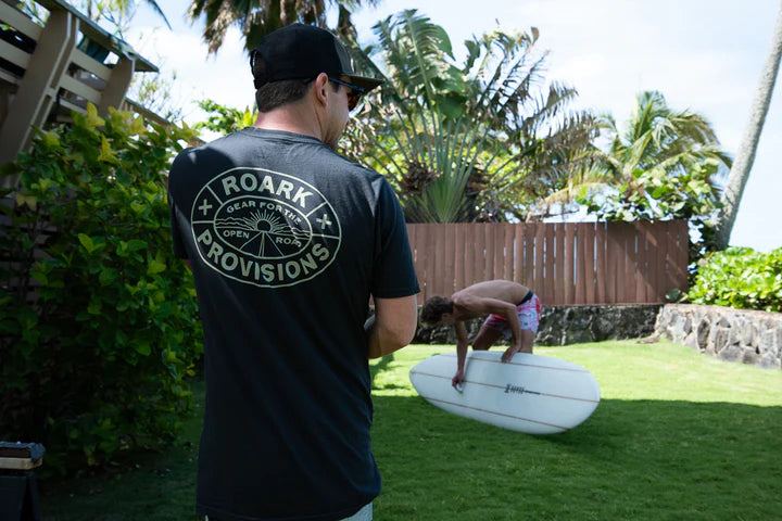 Man outside wearing the Provisions Premium Tee by Roark