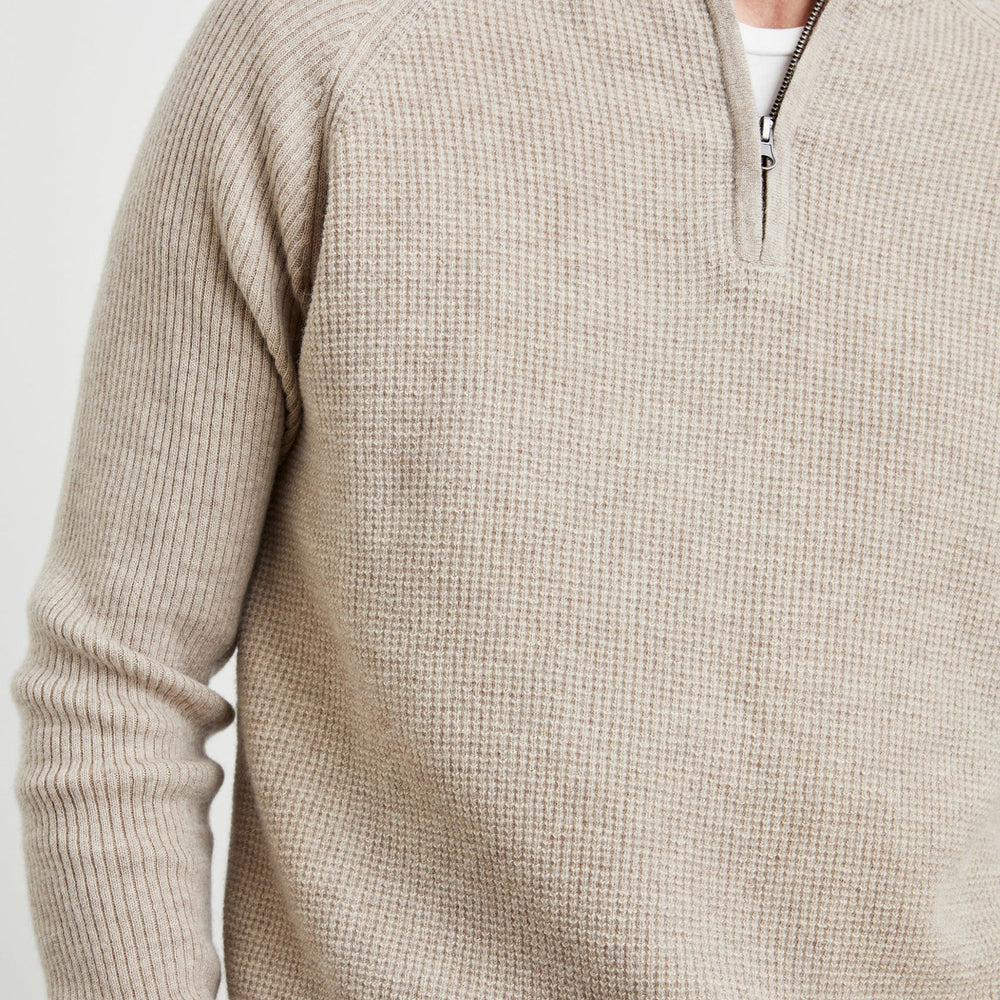 
                      
                        Men's long sleeve quarter zip pullover with a standard fit
                      
                    