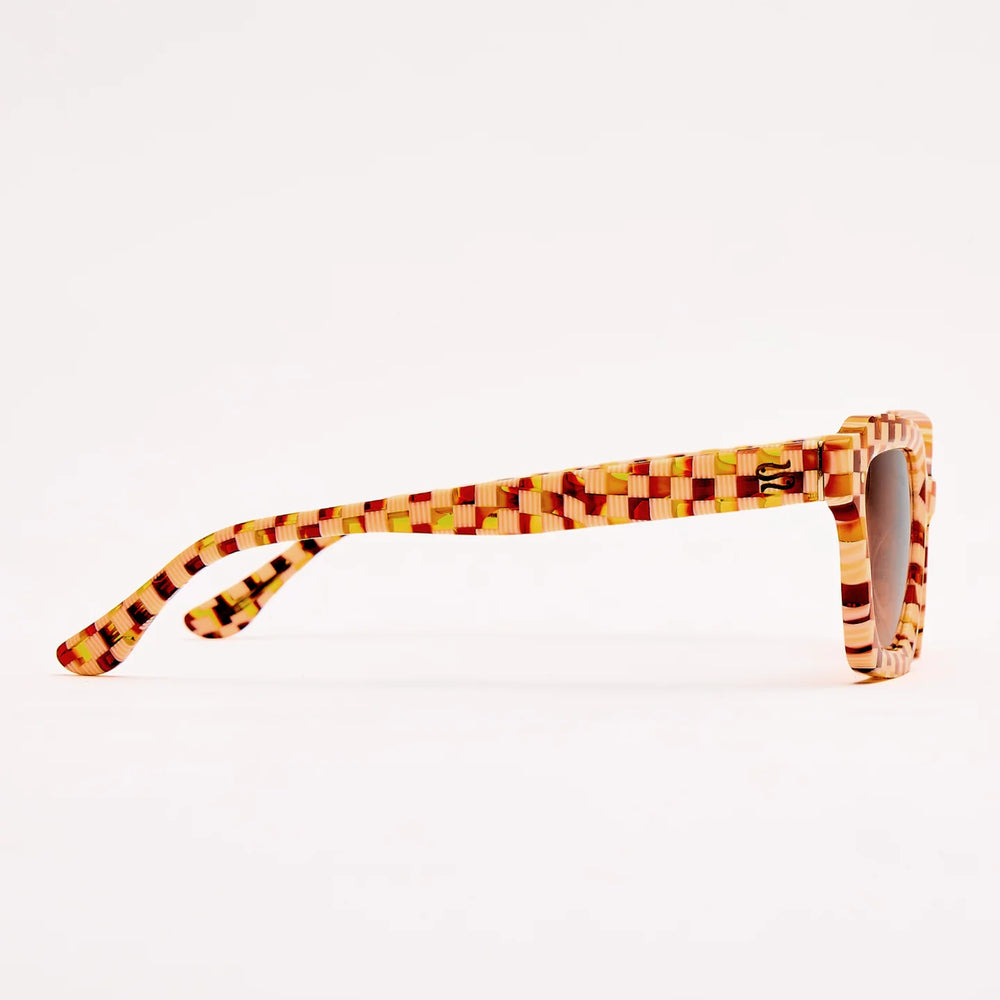 
                      
                        Find women's chic checkered square frame sunglasses by SARDINE at Harbour Thread women's boutique. 
                      
                    