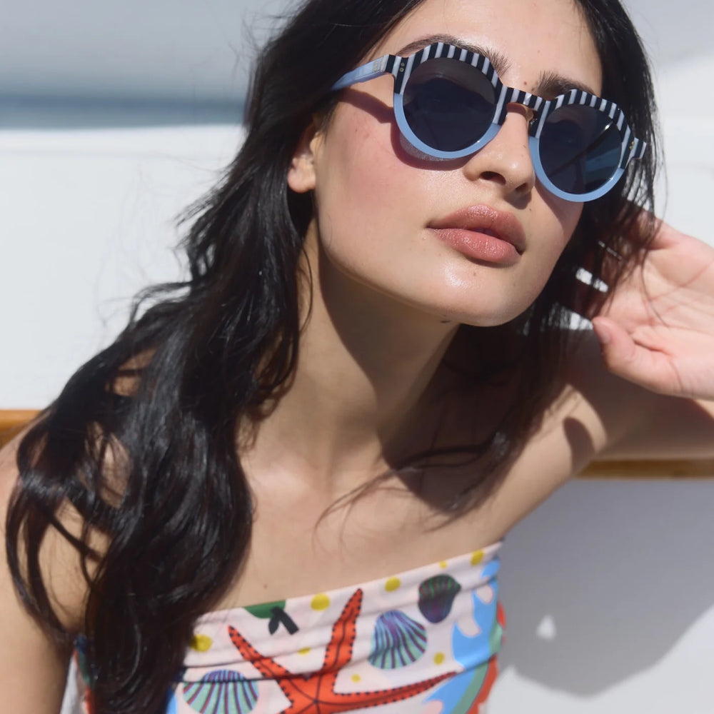 
                      
                        Shop the effortlessly cool Pool boy Blues Georgie Sunglasses by SARDINE at Harbour Thread
                      
                    
