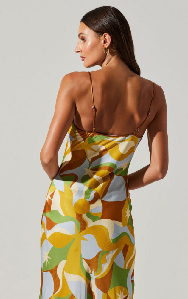 
                      
                        Closeup back view of woman wearing a multicolor keyhole front maxi dress
                      
                    