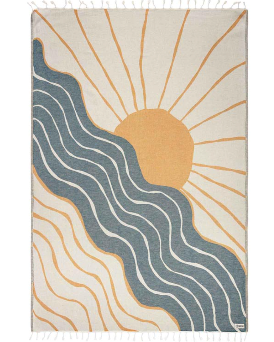 Large size beach towel unfolded to show the sun and wavy line design