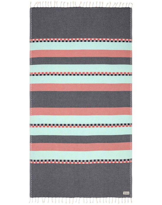 Unfolded view of a navy organic cotton beach towel with tassels at the end and various colorblocking stripes designed at the center