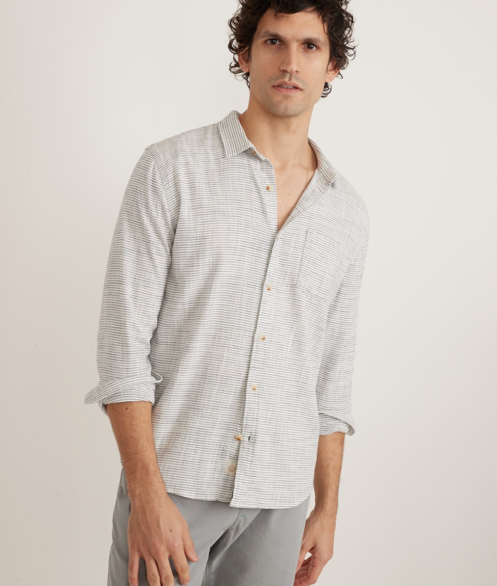 Front view of men's subtly striped long sleeve button up shirt
