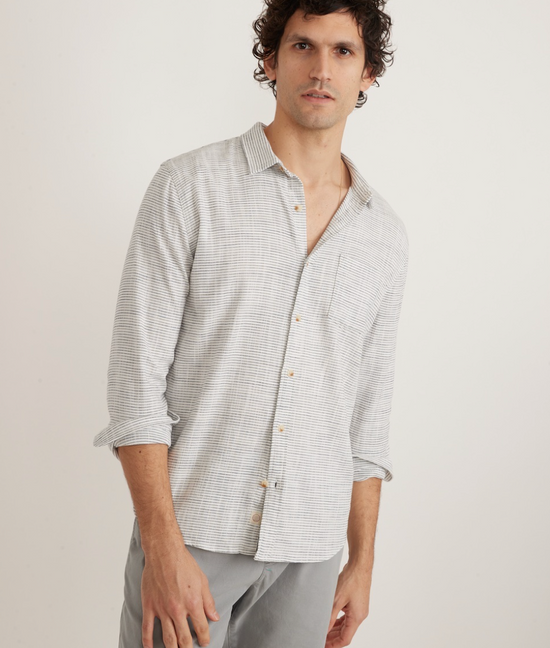 Front view of men's subtly striped long sleeve button up shirt