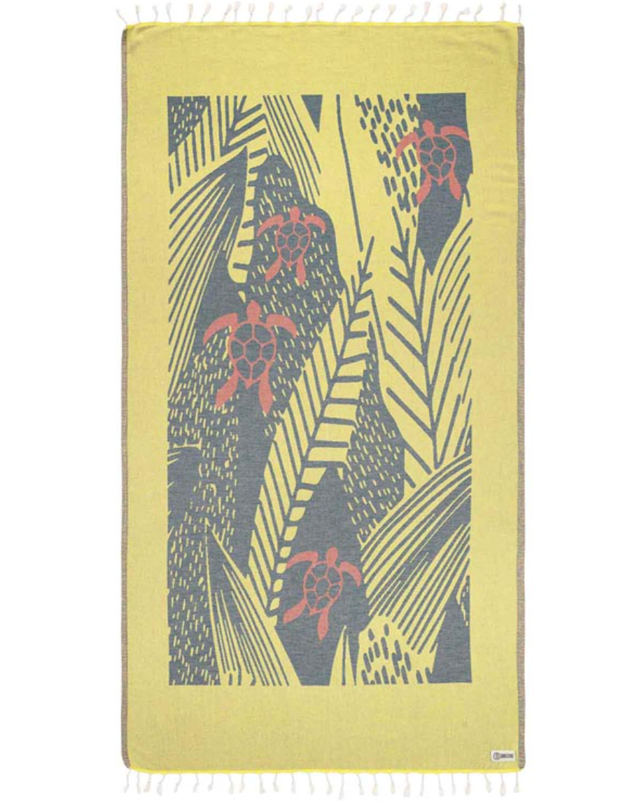Unfolded view of the lime green Reef Break beach towel featuring a design with turtles and sea plants and tassels at each end