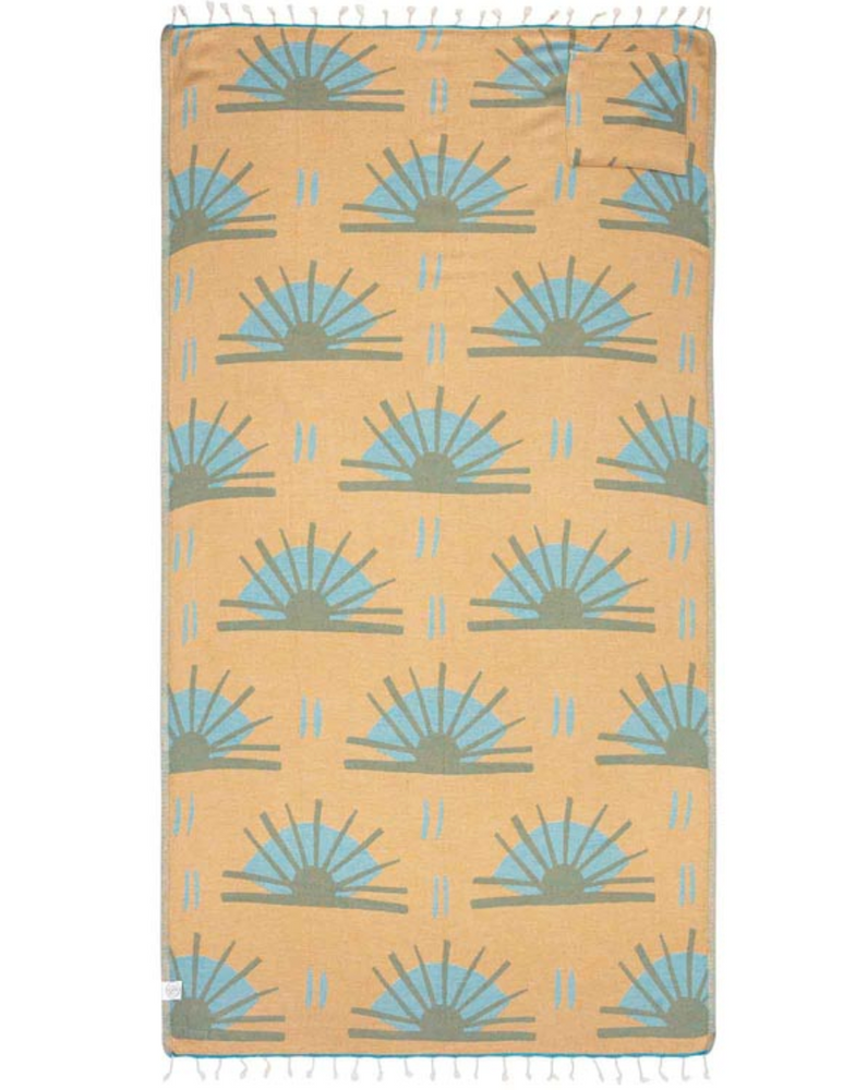 
                      
                        Unfolded view of reverse side of beach towel with repeated sunburst designs and tassels at the end
                      
                    