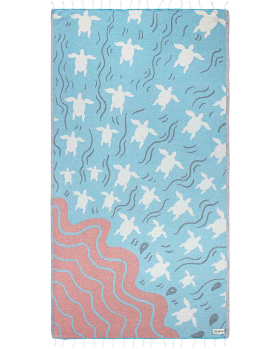 Unfolded view of Ruggles sea turtle design beach towel by Sand Cloud