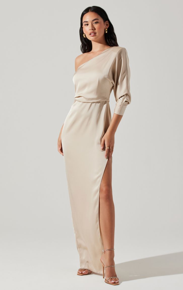Front view of champagne colored one-shoulder maxi dress