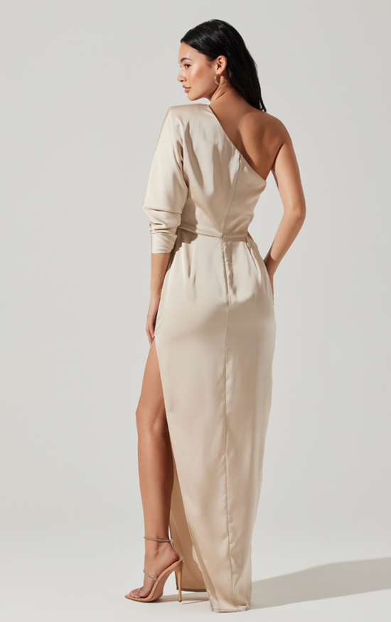 Back view of champagne colored one-shoulder maxi dress