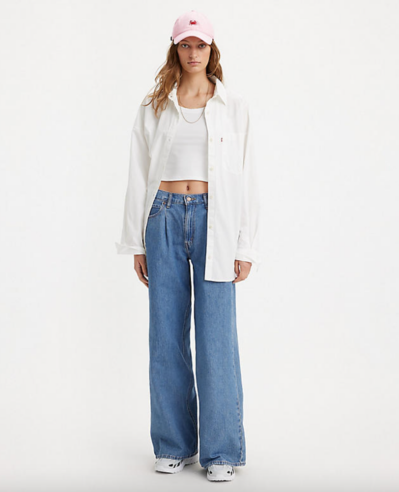 
                      
                        Front  view of a woman wearing the medium wash Baggy Dad Wide Leg Jeans by Levi's
                      
                    