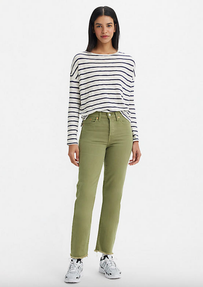 
                      
                        Front view of a woman wearing green high rise straight leg jeans by Levi's
                      
                    