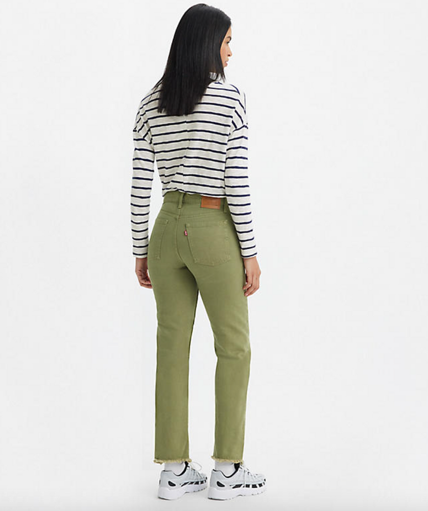 
                      
                        Back view of a woman wearing green high rise straight leg jeans by Levi's
                      
                    