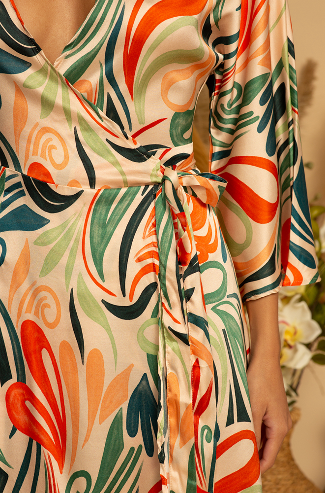 
                      
                        Side tie view of the Jade Swirls print Monterey Wrap Mini Dress by Shore
                      
                    