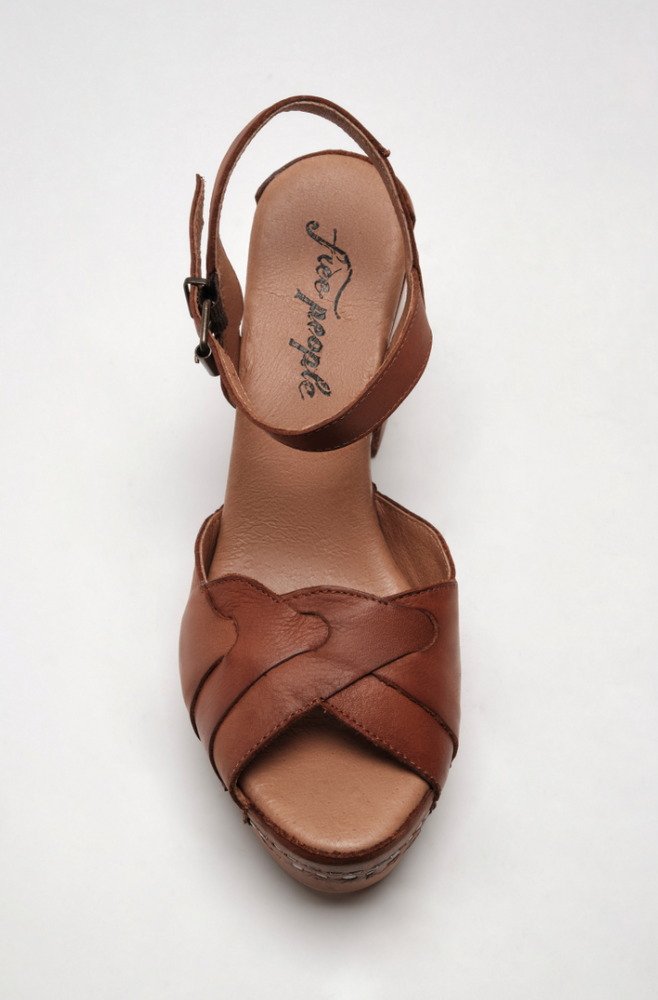 
                      
                        top view of Free People's Orion Clog in the color Teak
                      
                    