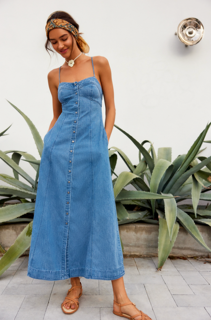 Woman wearing Free People's Just Jill Maxi Dress in the color Copen