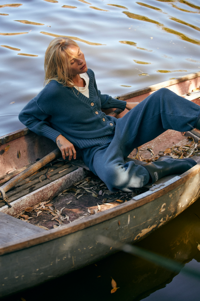 Woman on a boat wearing Free People's Hailee Cardi Set in the color Balsam