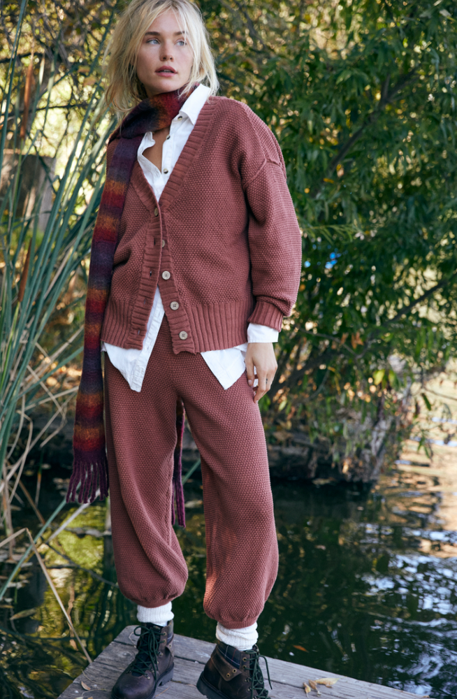 
                      
                        Woman outside wearing Free People's Hailee Cardi Set in the color Canyon Sunset
                      
                    