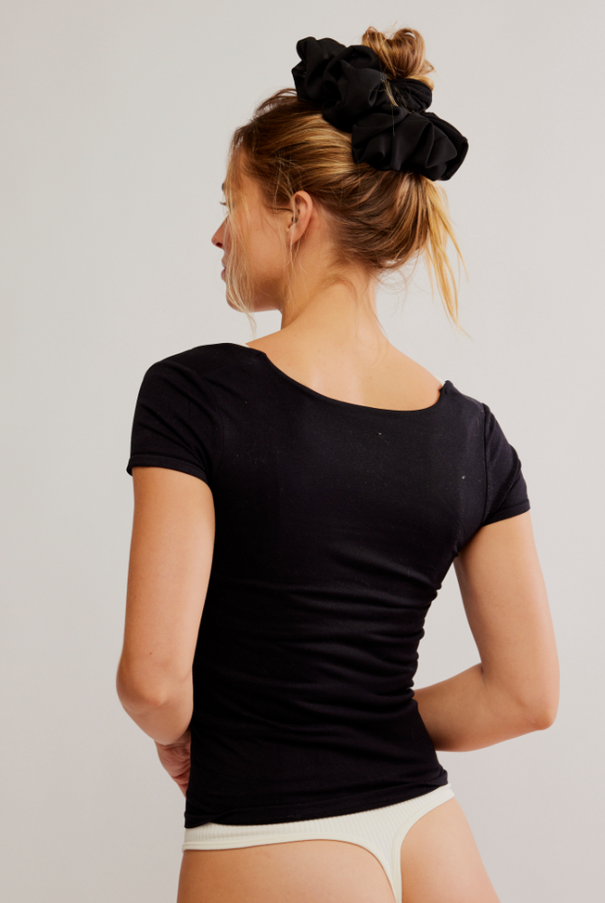 Back view of the Black Clean Lines Baby Tee by Free People