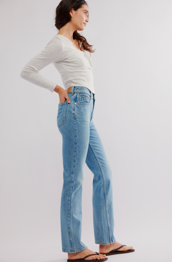 Side view of the Union Blue Xena Slim Straight Jeans by Free People