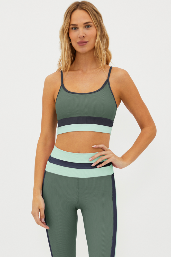 
                      
                        The Palm Paradise Colorblock Eva Top by Beach Riot worn as a sport top
                      
                    