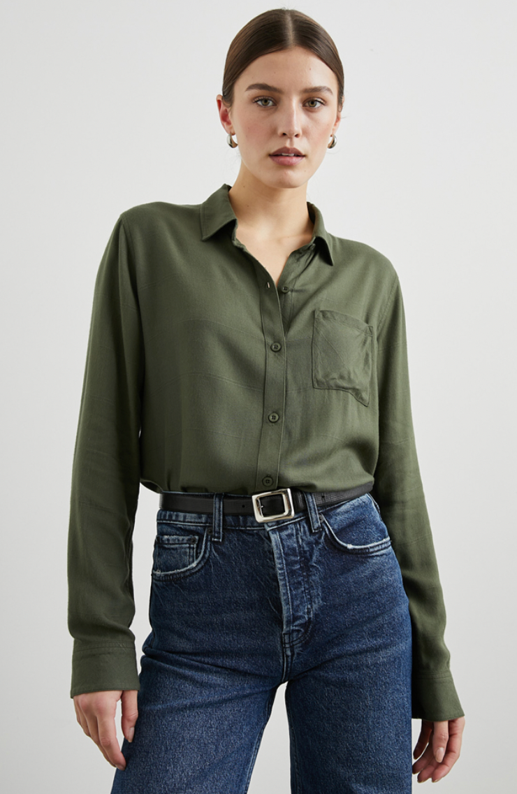 Front view of a woman wearing the olive green Hunter button down shirt by Rails