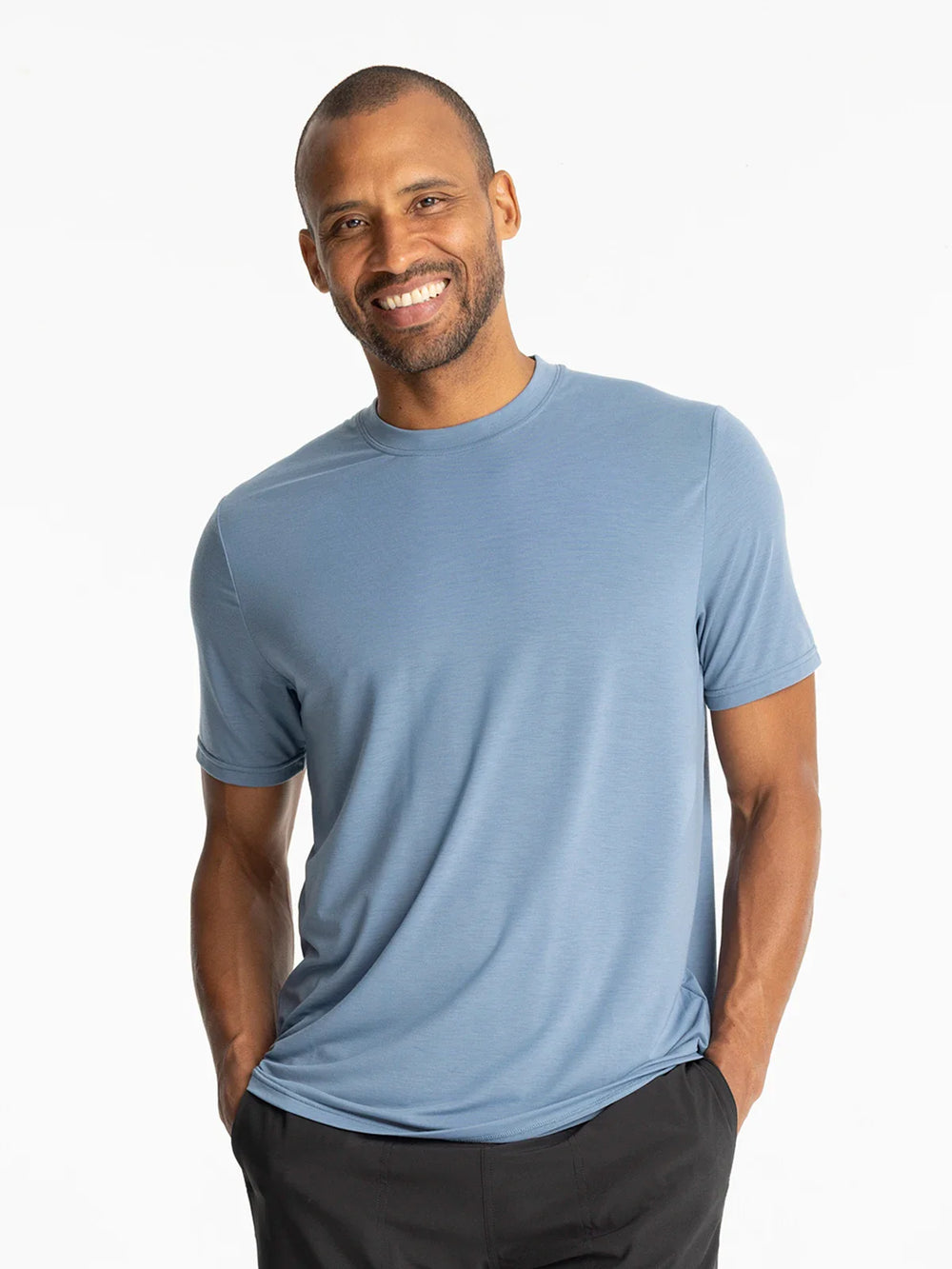 The Men's Elevate Lightweight Tee by Free Fly is available to shop in the color Bluestone at Harbour Thread. 