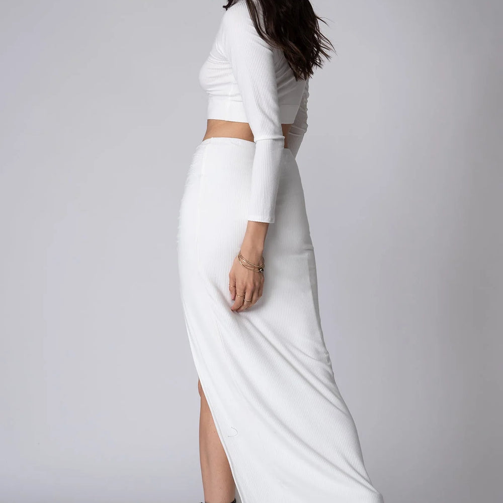 
                      
                        Back view of the White Get Together Maxi Skirt by Stillwater
                      
                    