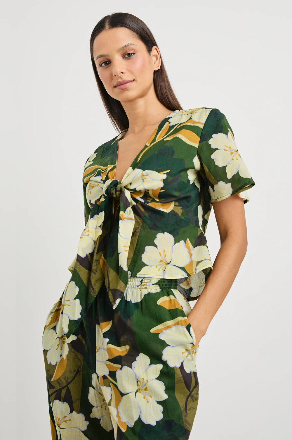 The Tia Top from Rails features front tie closure, a bold floral print and peplum hem. Shop now at Harbour Thread for an effortlessly chic warm weather look. 