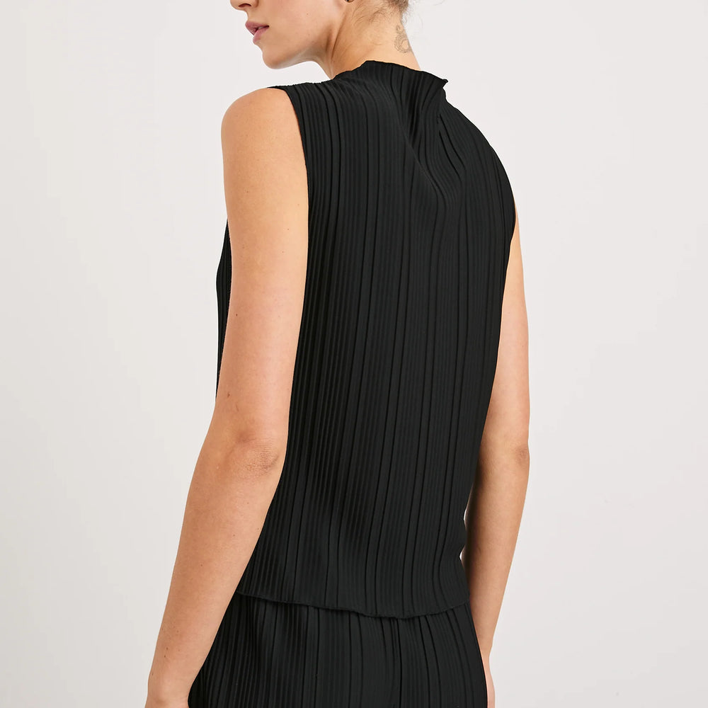 
                      
                        The Trea Top offers a sleeveless silhouette with a classic, relaxed fit
                      
                    