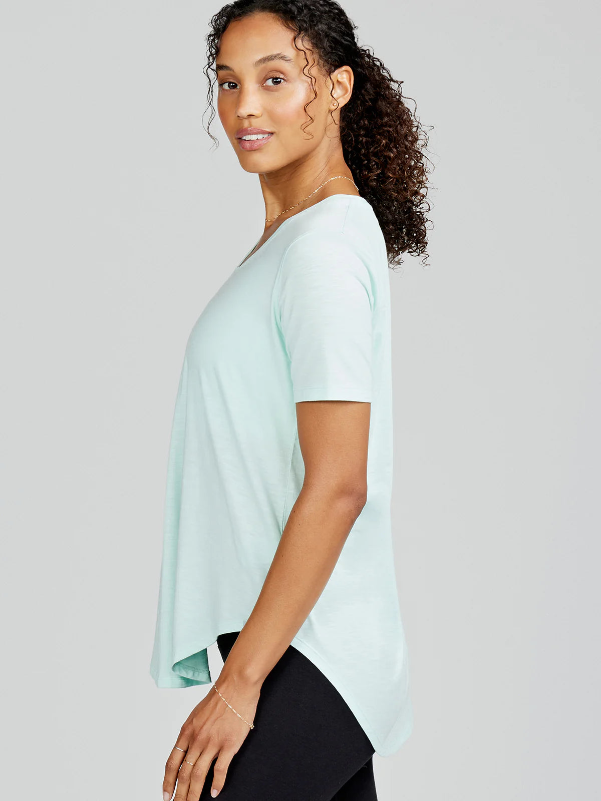 Side view of the Serene Longline T-Shirt by tasc Performance