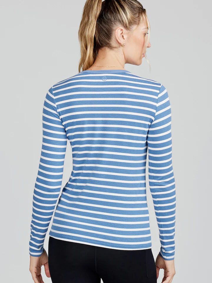 
                      
                        Back view of the blue and white stripe Nola Long Sleeve T-shirt by tasc Performance
                      
                    