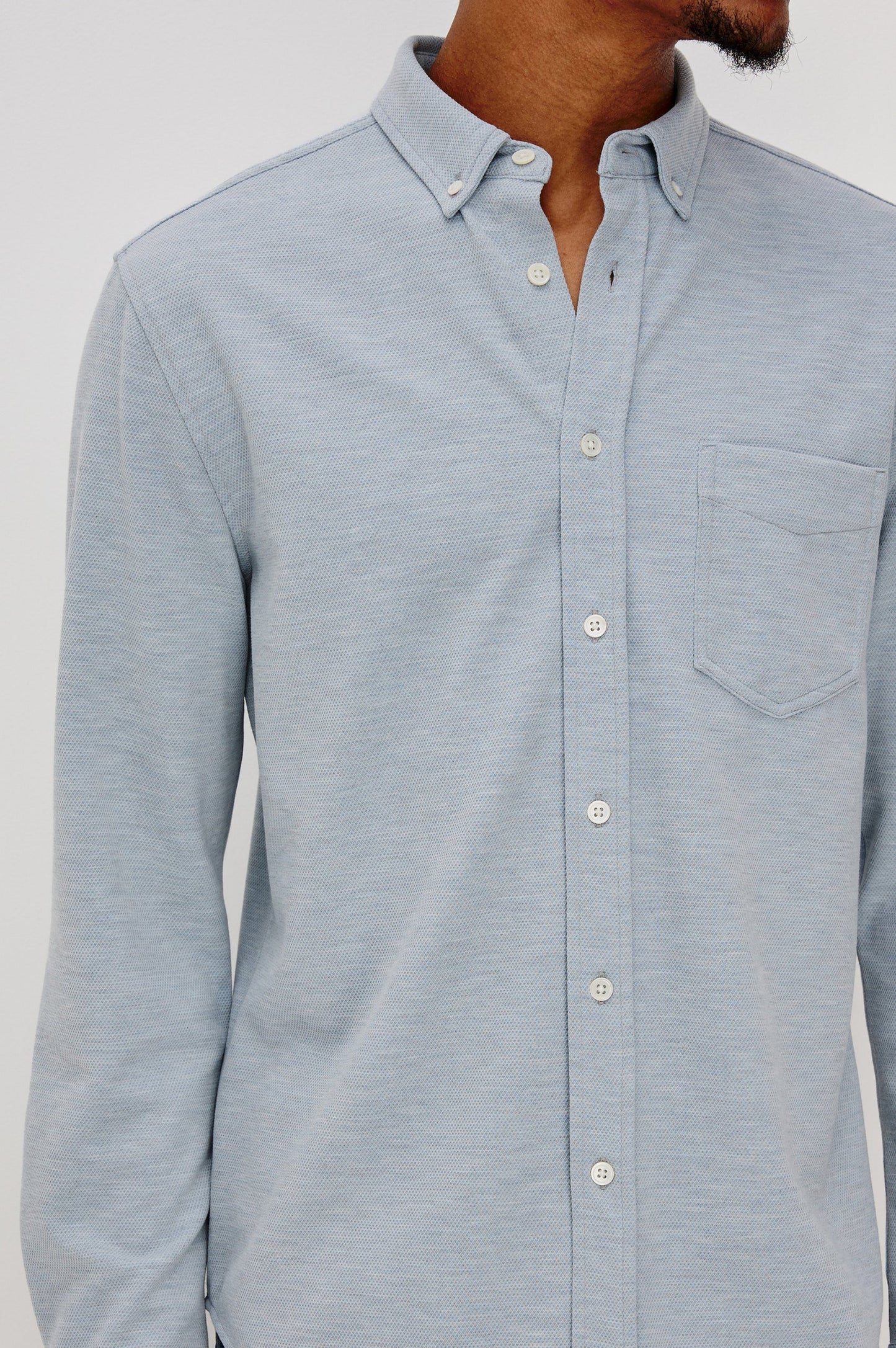 light blue long sleeve button up shirt