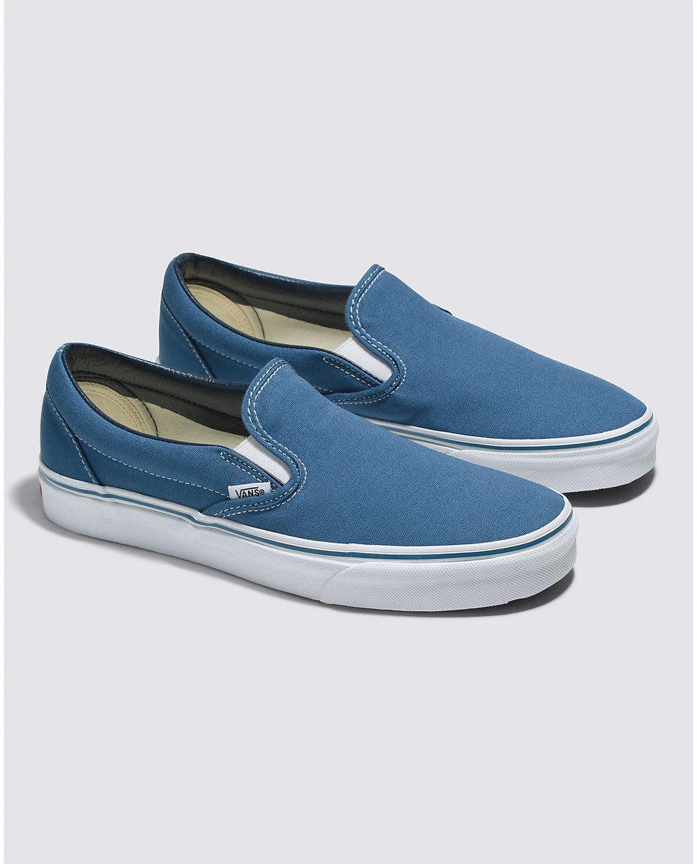 Vans Classic Slip-On Sneakers in the color Navy