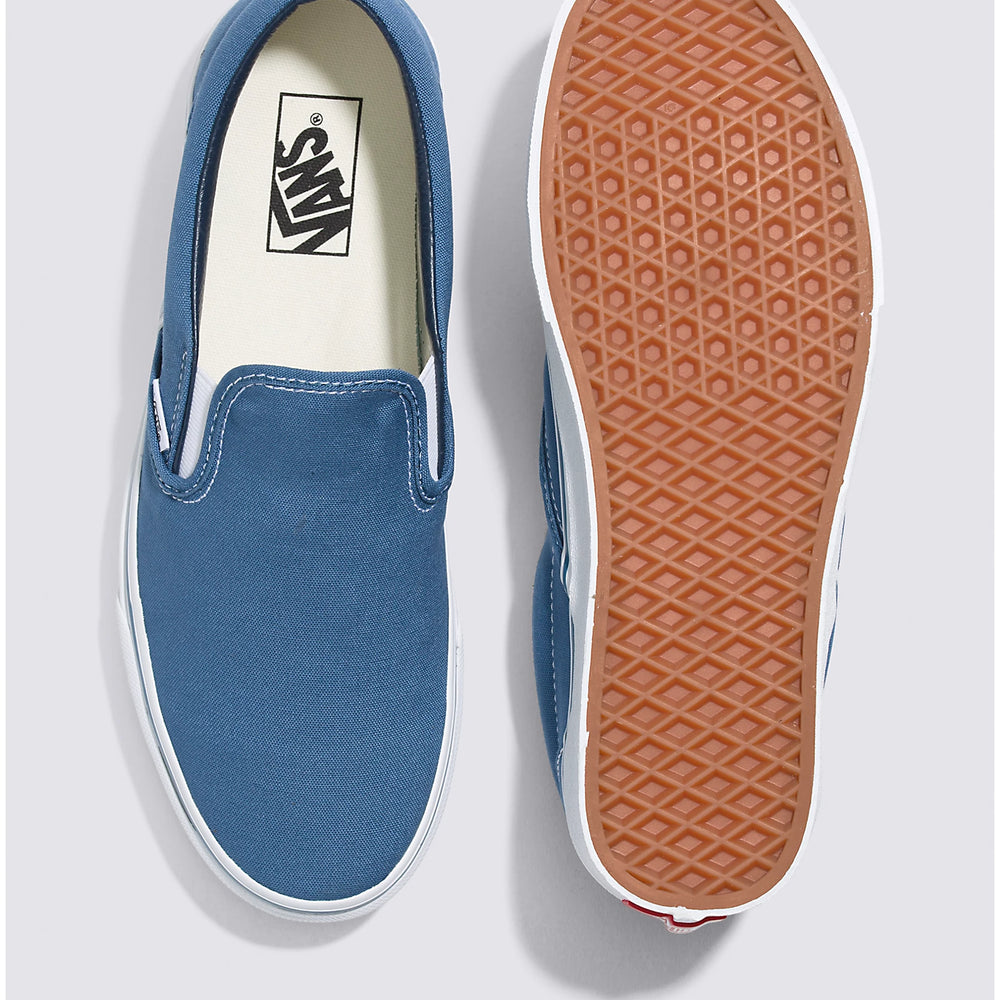 
                      
                        Top and bottom flat lay view of the Vans Classic Slip-On Sneakers in the color Navy
                      
                    