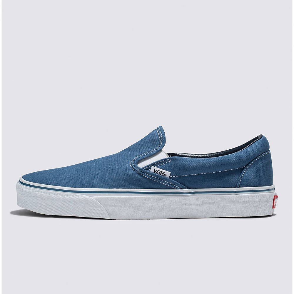 
                      
                        Side profile view of the Vans Classic Slip-On Sneakers in the color Navy
                      
                    